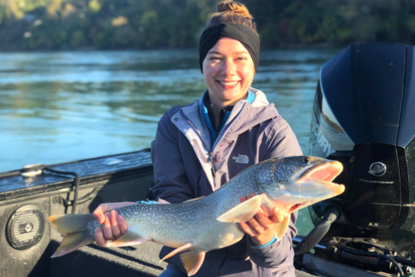 Holding a lake trout caught in the Lower Niagara River